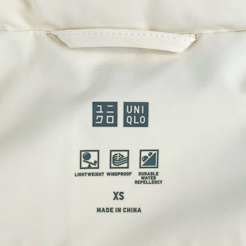 UNIQLO • Cream Seamless Hooded Down Puffer Jacket, XS - Picture 11 of 16
